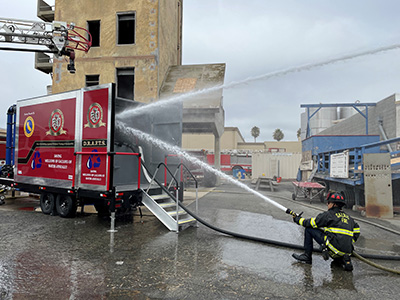 Firefighter testing equipment in Salinas